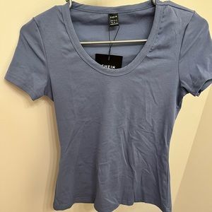 Fitted Blue T-shirt.